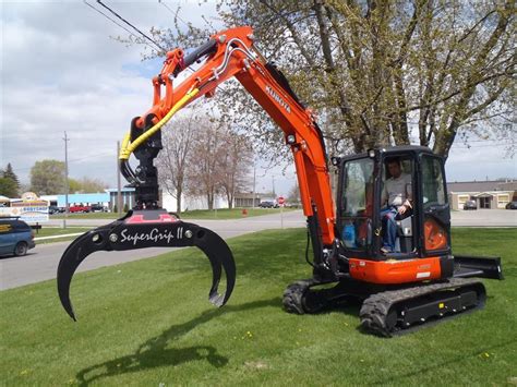 mini excavators grapple